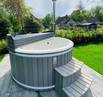 Ewijk House | 6pers Boshuis -Hottub Jacuzzi- 'De Groene Specht'