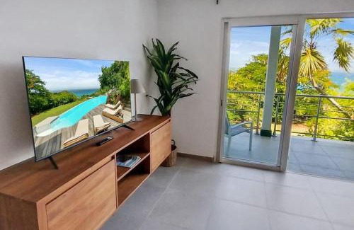 Anse Marcel Villa | 7 bedrooms Villa, Nestled in the heights of Anse Marcel, one of the most discreet bays of the island.