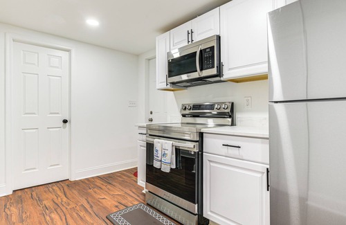 Brooklyn Park Apartment | 7 Mi to Baltimore: Maryland Gem w/Shared Yard!