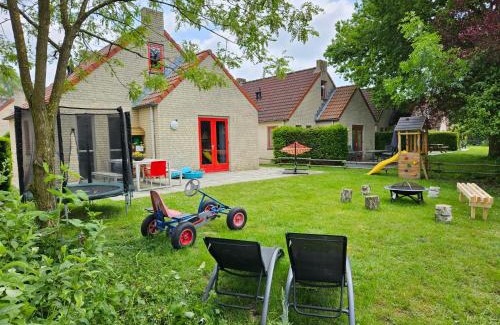 Ewijk House | 7 person House with garden, firepit, swimming lake, hammock, child friendly, in- and outside playground, slide, and great coffee