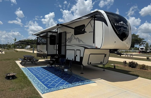Fellowship RV Rental | 70' RV Pad at Champion's Run Luxury RV Resort with full hookups