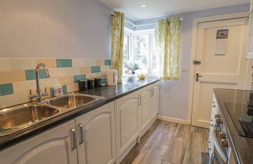 Gatehouse-of-Fleet Cottage | 79 LAUREL BANK, pet friendly, with a garden in Gatehouse Of Fleet