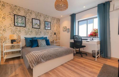Santo Antonio dos Olivais House | 7Min to Uni Sé-Velha - AC - Work Desk - 300MBs WiFi - Suite 5