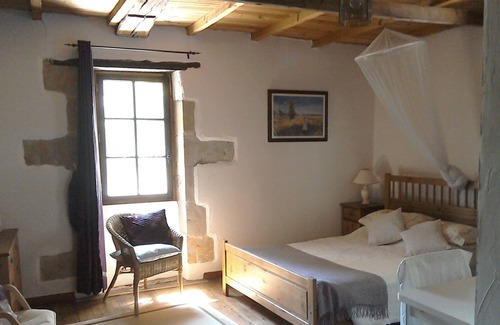 Puymiclan House | A 200 year old house attached to an 11th century water mill in peaceful gardens.