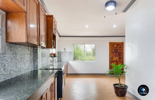 Loon House | A 5-minute walk fromseashore perfect for scuba diving and any water activity.