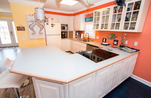 Flor-a-mar House | A bit of Key West in New Port Richey: Bright Home w/Pool & Boat Dock Access!