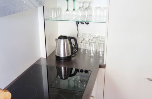 Rosheim Apartment | A cozy and comfortable cottage with a view of the Romanesque house