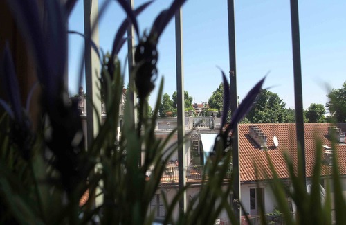 Vanchiglia Apartment | A cozy bohemian rooftop nest in downtown Turin