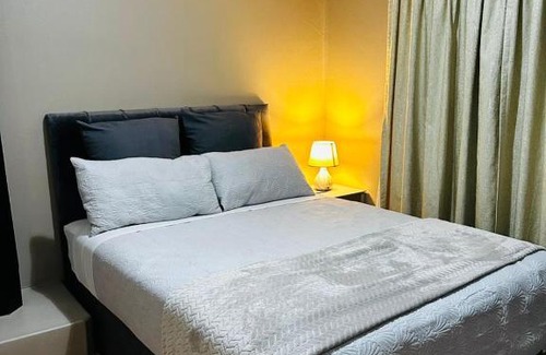 Gaborone Apartment | A Cozy Secure 2-Bed Apartment with a lovely garden