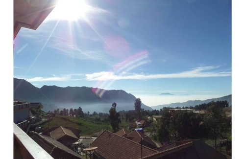 Ngadisari Bed & Breakfast | A decent bedroom with bathroom near Cafe Lava Rst. 45minutes walk to Mt. Bromo