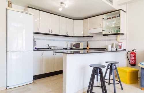 Playa de Mogan Apartment | A few meters from the beach with a large terrace and mountain views.