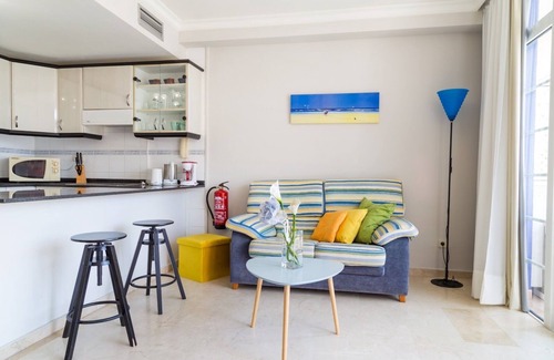 Playa de Mogan Apartment | A few meters from the beach with a large terrace and mountain views.