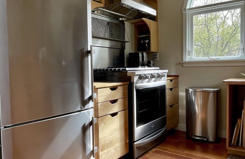 Pine Creek Cottage | A-Frame Cottage with Creek, Barn, Game Room, Fire Pit, Hot Tub, Sleeps 10