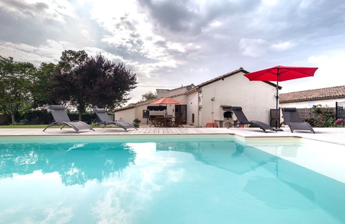 Saint-Mariens House | A Gite called La Grange, with garden, BBQ area and heated swimming pool.