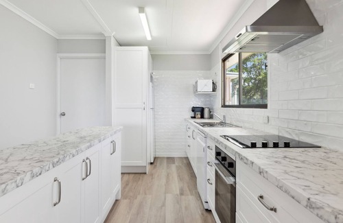 Arrawarra Headland House | A holiday home where the beach is at your doorstep, the views are the envy of many and where one day
