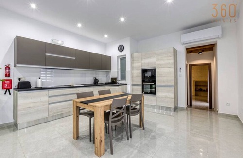 Il-Balluta Apartment | A lovely 1BR home with Balcony off the coast.