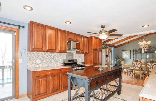 Morton House | A MANSION WITH A HUGE INDOOR HEATED SWIMMING POOL WITH A BONUS THEATER ROOM.