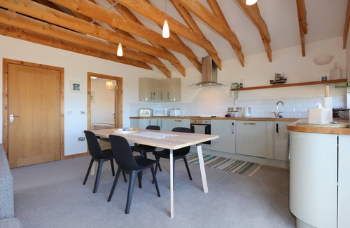 Dunbar Apartment | A modern, seafront chalet offering stunning beach views of Belhaven Bay.
