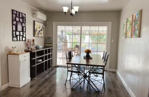 Norwalk House | A small room in the backyard with a full bed