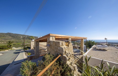 Peyia Town Villa | A stone built single storey villa that sleeps 6 guests in 3 bedrooms/amazing sea views
