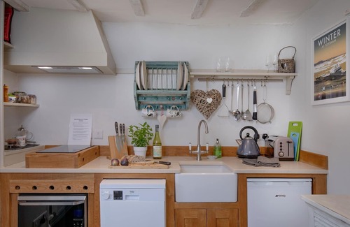 Honiton Cottage | A stunning, one bedroomed, beamed thatched cottage in the village of Stockland.