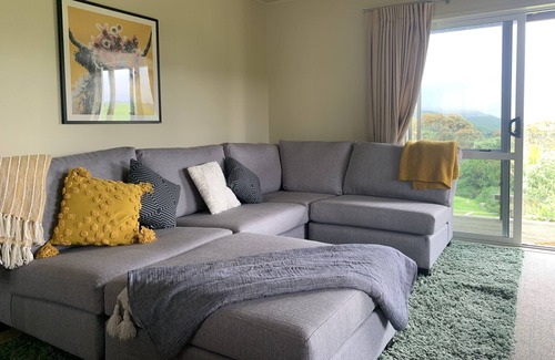 Awhitu House | A sunset paradise, 3 bedroom home on a hill with views to the ocean