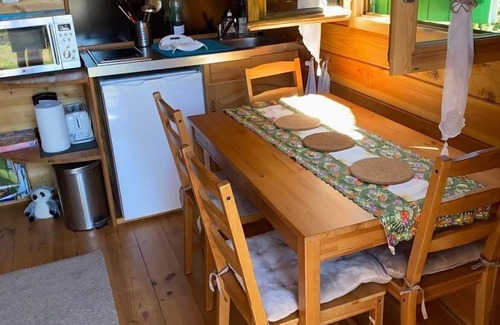 Cublac Ski Chalet | A wooden caravan at Domaine de la Morétie