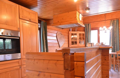Ovifat Ski Chalet | A wooden chalet located in a quiet and green