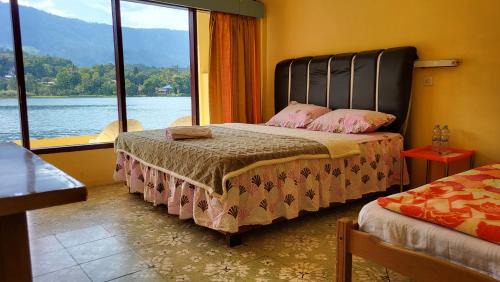 Tuk Tuk House | Abadi Guest House Tuktuk