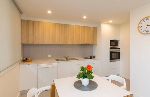 Woolgoolga Apartment | Absolute beachfront location, king size bed to relax and recover.Lock up garage
