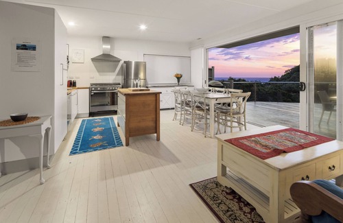 Scotts Head House | Absolute waterfront beach house with massive deck - family and dog friendly