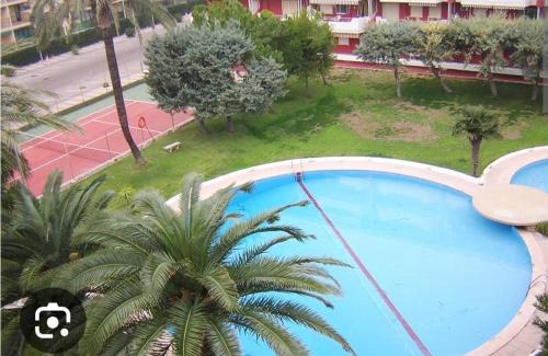 Daimuz Apartment | Acogedor apartamento en Daimús a 150 metros de la playa con parking privado y piscinas comunitarias