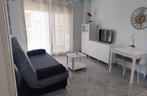 Daimuz Apartment | Acogedor apartamento en Daimús a 150 metros de la playa con parking privado y piscinas comunitarias