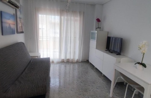 Daimuz Apartment | Acogedor apartamento en Daimús a 150 metros de la playa con parking privado y piscinas comunitarias