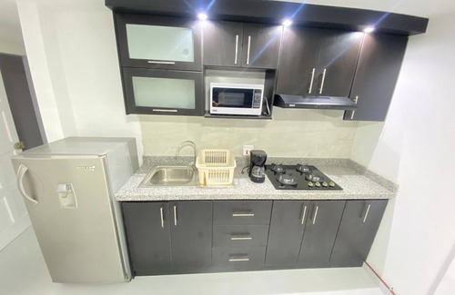 Banos de Agua Santa Apartment | Acogedora suite para parejas con jacuzzi en la habitación a 2 min del centro