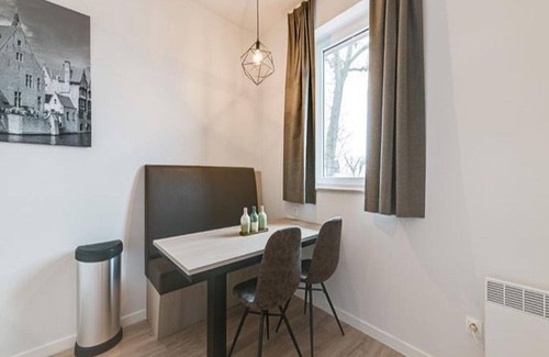 Jabbeke Apartment | Adapted studio with dishwasher, on a resort, near a recreational lake