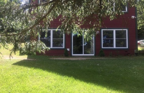 Ellenburg Center Apartment | Adirondack Hideout, lakefront location and sandy shoreline