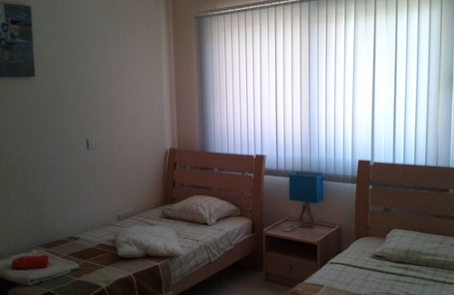 Oroklini Apartment | Adonis-Ground Floor Apartment with Secure Private Garden. Free use of car & Wifi
