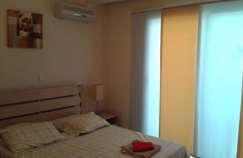 Oroklini Apartment | Adonis-Ground Floor Apartment with Secure Private Garden. Free use of car & Wifi