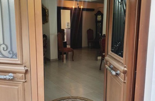 Koili House | Adonis Palace Rooms and Bungalows
