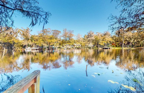 Bushnell Cabin | Adorable A-Frame with Riverfront Yard, Fishing Pier, & Firepit