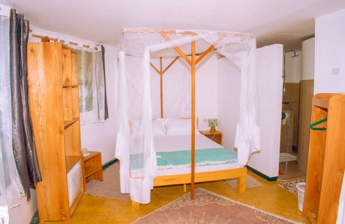 Iringa Bed & Breakfast | Aika Sunrise Treetops Home