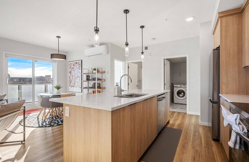 Southeast Calgary Apartment | Air Conditioned 2 BR Luxury Suite/w King Bed