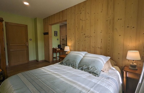 Rehaupal Bed & Breakfast | Air-conditioned family room with garden access
