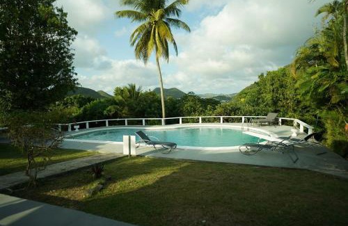 Choc House | Almarlene House, spacious home sea view, large pool, patios, cot, cook