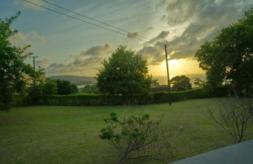 Choc House | Almarlene House, spacious home sea view, large pool, patios, cot, cook