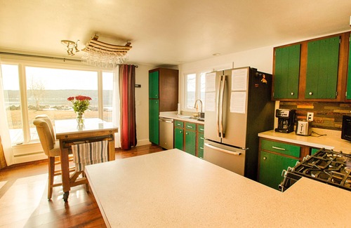 Lansing House | Almost an island in Cayuga Lake! Private & panoramic 650' of level lake frontage