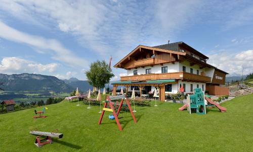 Sankt Johann in Tirol Hotel | Alpengasthof Hirschberg