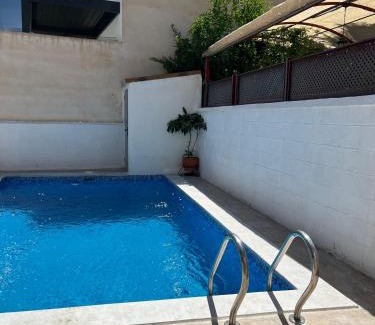 Zaidin Apartment | Alquibla relax y armonía con piscina junto a restaurantes y supermercados