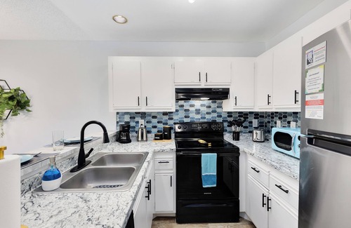 Titusville Apartment | *Amalfi Allure* *NASA*Pool, Gym, BBQ, Arcade, Games